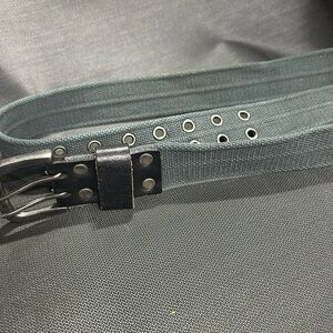 Medium charcoal gray canvas 1.5” wide 43.5” long belt with black leather ends
